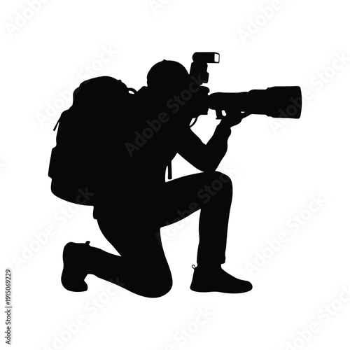 Wildlife Photographer with Telephoto Lens Silhouette
