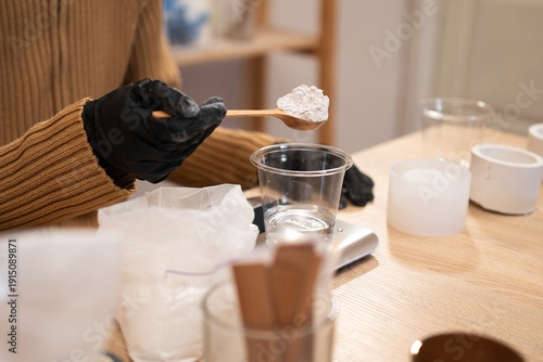 Tableau sur toile Close-up of made crafting handmade gypsum candle holders in a creative workshop