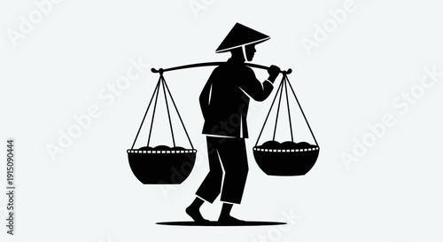 Man carrying baskets on shoulder with pole silhouette.