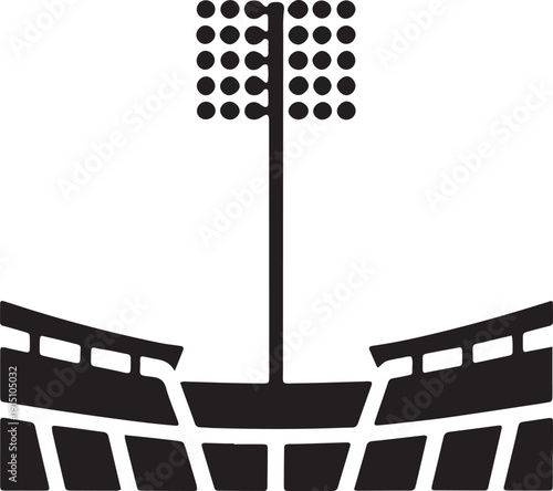 Floodlit sports stadium grandstand with arena seating and tall light tower silhouette design