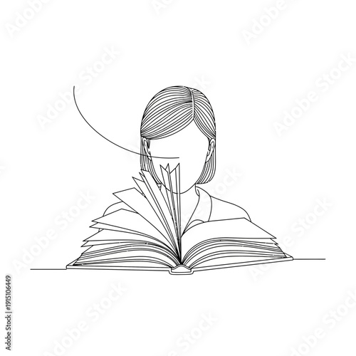 Woman deeply engrossed in reading a book with focused expression