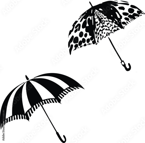 Vector illustration set of open colorful umbrellas including black and white and black and red designs for rain protection and autumn weather isolated as icons