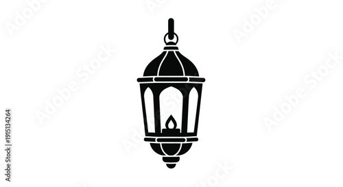 Black ornate lantern hanging from a chain a striking silhouette