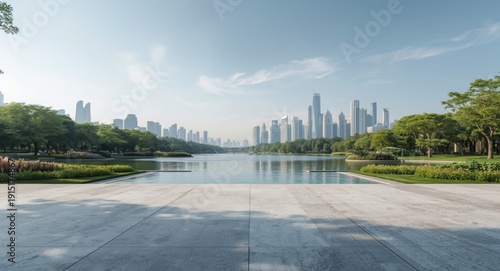 Smooth cement floor with copy space overlooking a tranquil lake garden and futuristic city skyline