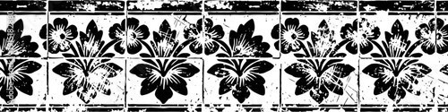 Decorative floral tile pattern in black and white with stylized flowers and leaves design