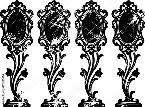 Set of four vintage ornate hand mirrors with cracked and scratched reflective surfaces in black silhouette