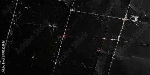 A macro shot of rain drops on a window creates an abstract pattern of water against an aged black grunge wall with a white spider cobweb texture