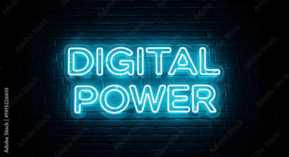 Fototapeta premium Bright cyan neon sign displaying the bold message digital power glowing against a dark brick wall backdrop
