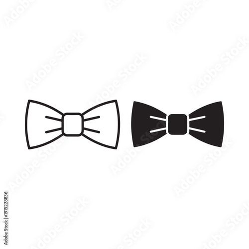 Two bow ties one white and one black displayed side by side