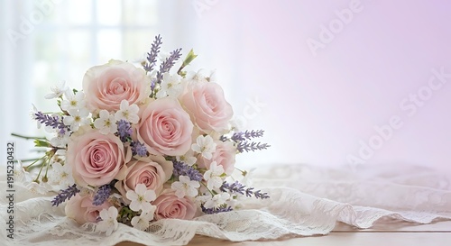 Elegant bridal bouquet with soft pink roses, white flowers and lavender sprigs on delicate lace fabric against dreamy pastel background for weddings.
