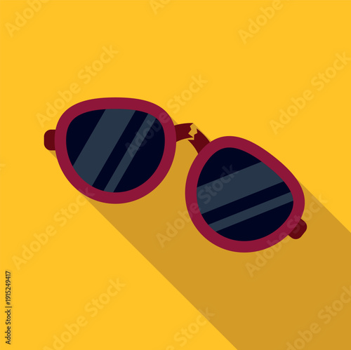 Broken red sunglasses with dark lenses on a yellow background, showing damage and repair