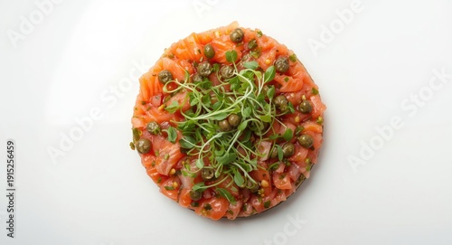Top view photo of a vibrant mixed fish tartare combining salmon and sea bream with microgreens and capers garnish