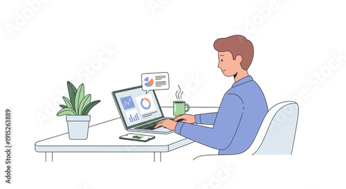 Young man working diligently on his laptop at a desk.