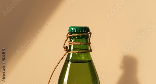 Caps attached to bottles by...