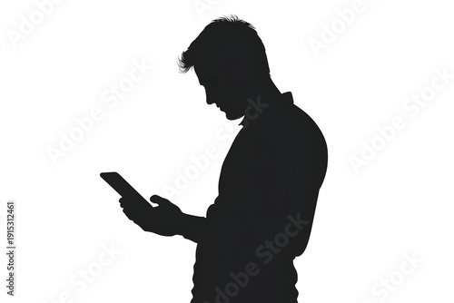 Silhouette of Man Engaged with Tablet: A captivating silhouette of a man engrossed in his tablet. The image portrays modern connectivity.