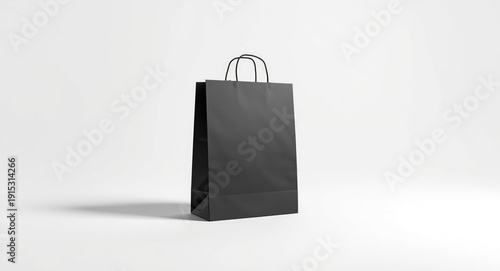 Black paper bag placed on a...