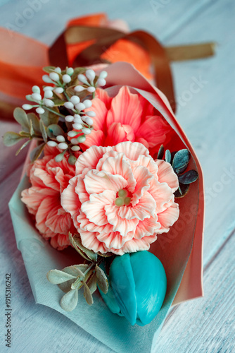 Romantic pastel flower bouquet on wooden background with copy space. Soft floral arrangement for greeting cards, branding, wedding design, social media, banners and decorative backgrounds. 
