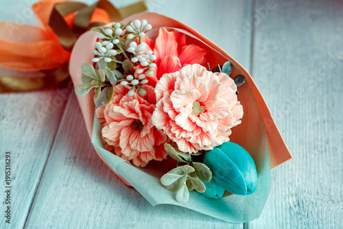 Romantic pastel flower bouquet on wooden background with copy space. Soft floral arrangement for greeting cards, branding, wedding design, social media, banners and decorative backgrounds. 