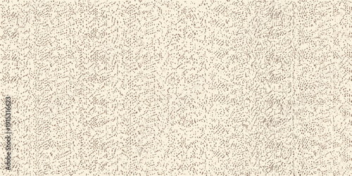 Close up of a textured beige fabric with a subtle grainy pattern