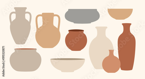 Collection of various ceramic vases and bowls in different shapes and earth tones.