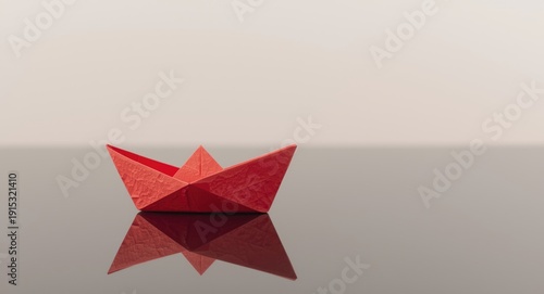 Red paper boat used to illu...