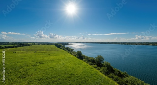 Aerial view of a wide green...