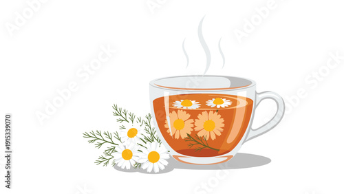 Clear glass cup filled with steaming chamomile tea is presented next to a bunch of fresh chamomile flowers with yellow centers and petals.