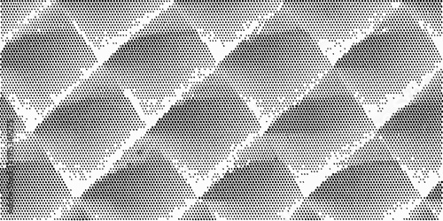 Abstract grayscale pattern featuring repeating triangular shapes and optical illusion