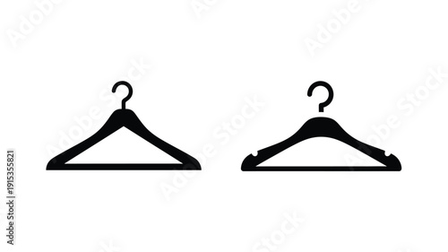 Two black clothing hangers displayed against a white background silhouette