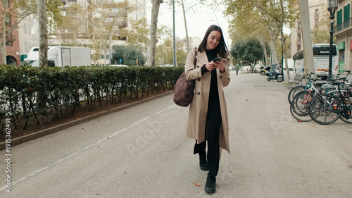 Wallpaper Mural Woman Walking On City Street In Beige Trench Coat Torontodigital.ca
