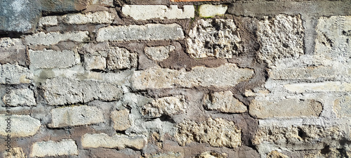 Tableau sur toile Primer plano de una textura de muro de piedra antigua y rugosa