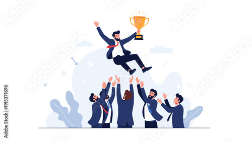 Successful business team celebrating victory by throwing their male colleague into the air with a golden trophy at a corporate event.
