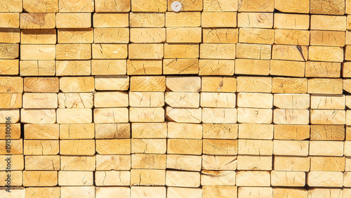 Φωτογραφία Mosaic-like pattern of sawn ends of a stack of fresh lumber outdoors on a reside
