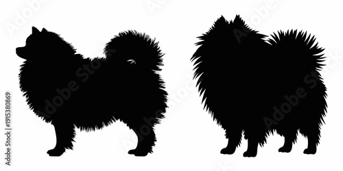 Two black silhouettes of fluffy pomeranian dogs facing different directions