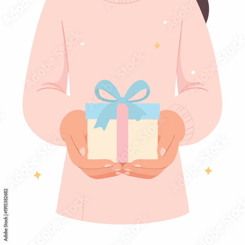 A person holding a beautifully wrapped gift box with a blue bow and pastel colors in their hands