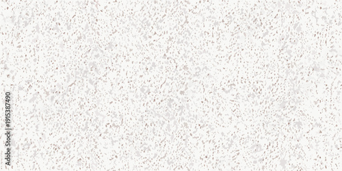 Close up of a textured speckled surface with neutral tones