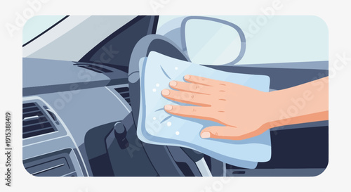 A hand wipes down the interior of a car with a blue cloth