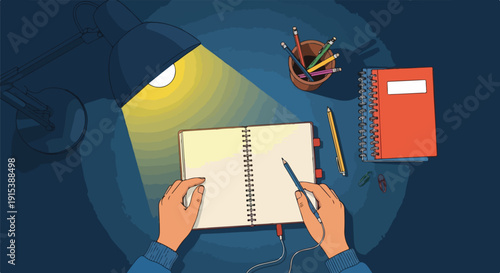 Overhead view of hands writing in a notebook under a desk lamp at night, with art supplies nearby
