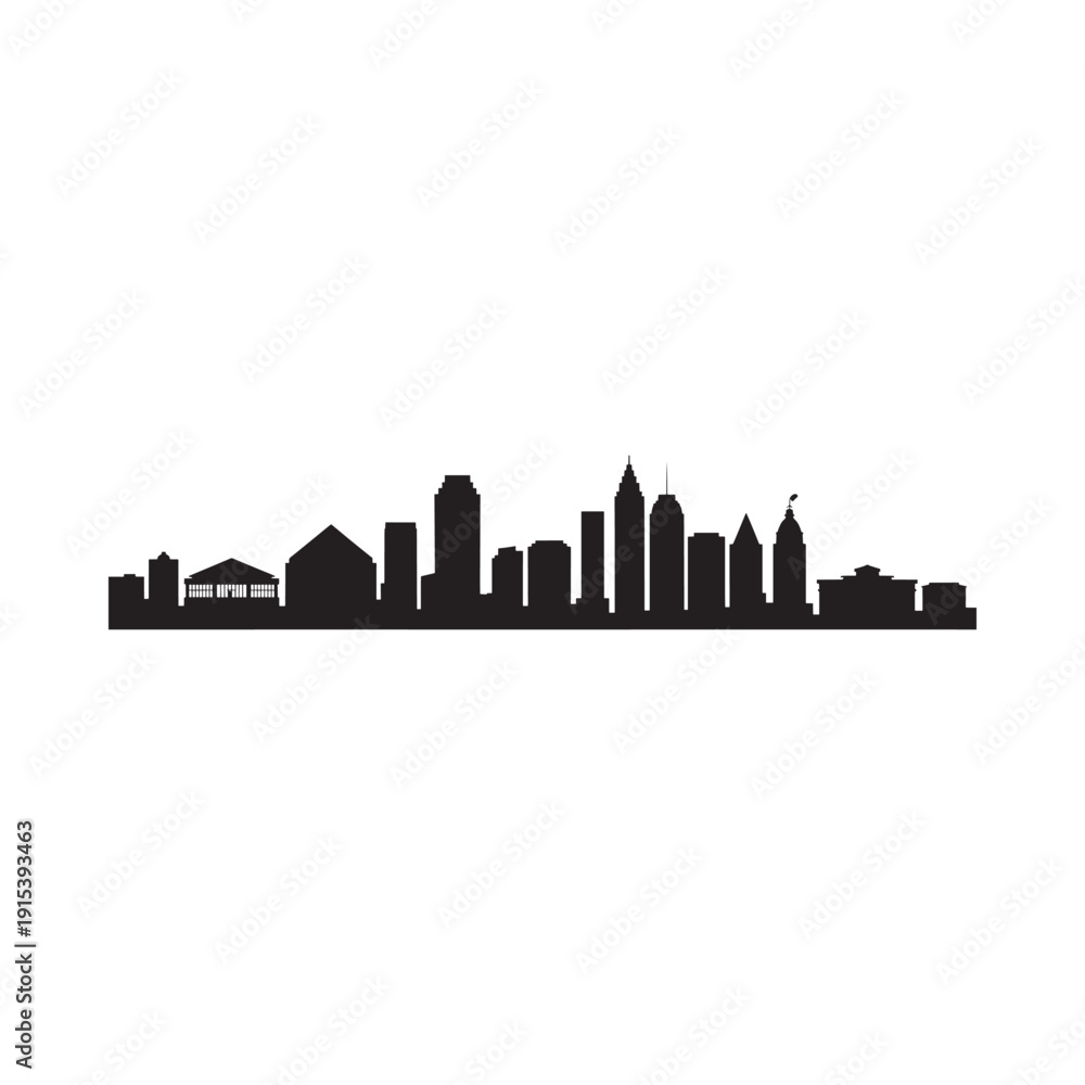 Fototapeta premium Silhouetted cityscape showcases a modern skyline with diverse building heights