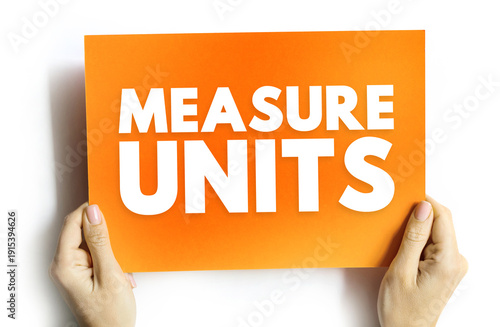 Wallpaper Mural MEASURE UNITS text on card held by hands, concept of measurement, education, science, and learning terminology Torontodigital.ca