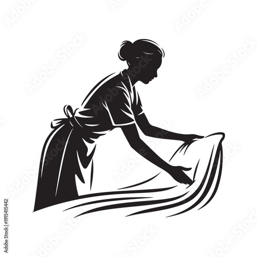 Silhouette of a woman in an apron straightening a sheet