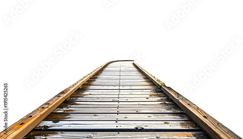 Perspective view of a wooden walkway extending to the horizon against a stark black backdrop