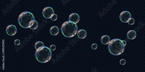 Realistic colorful soap bubbles on transparent background
