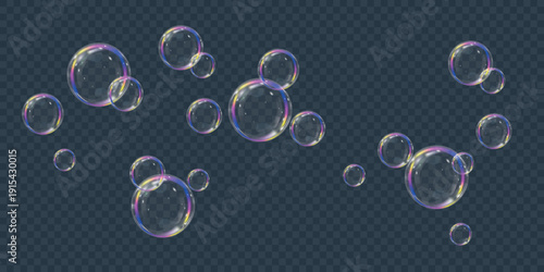 Realistic colorful soap bubbles on transparent background