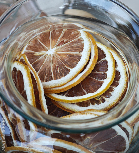 Glass jar  filled with dried lemon slices