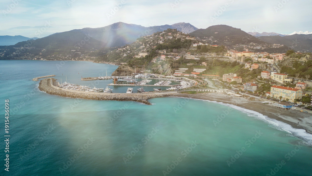 Obraz premium Aerial view of Ventimiglia with Mediterranean coastline and historic old town