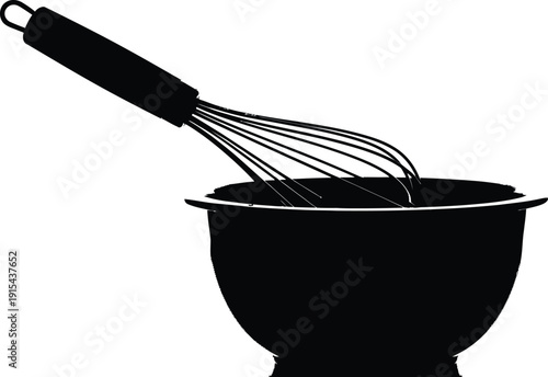 Black silhouette of a kitchen wire whisk in a mixing bowl.