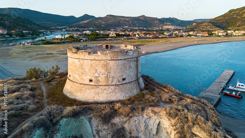 Aerial close-up of the historic Aragonese tower in Bosa Marina, Sardinia, Italy