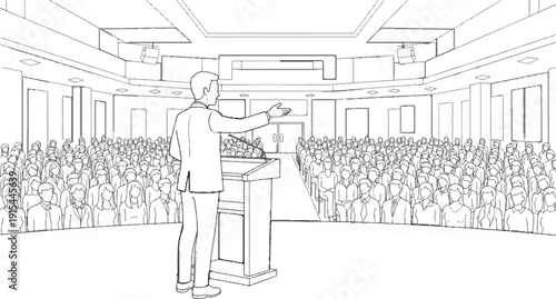 A man speaks to a large, attentive audience in a convention hall