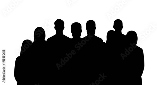 Silhouettes of a group of people standing closely together in unity